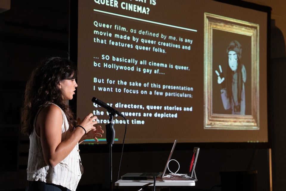 A woman presenting a presentation.