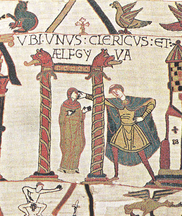 The Latin text says "ubi unus clericus et Alefgyva" and shows a cleric touching a woman's face. A nude figure is reaching upward in the lower margin. Nope, nobody knows why. There are theories!