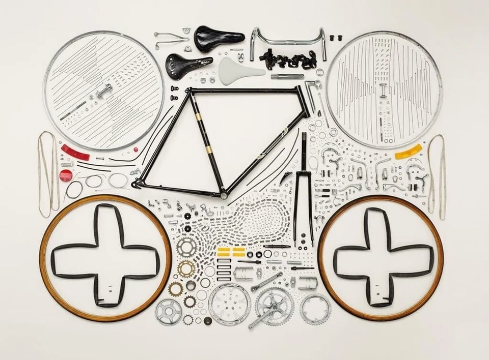 A photograph of a bicycle that's been deconstructed into its many constituent parts (all the way down to taking the chain apart), with the resulting pieces laid out in an aesthetically appealing manner against a white background. I like this image because a bike is a good metaphor for improv but it also speaks to the danger of trying to analyze something that's not rational: you risk destroying everything about it that made you want to analyze it in the first place. Anyway, come to Mercury Monthly, I promise the bike will still be rideable.