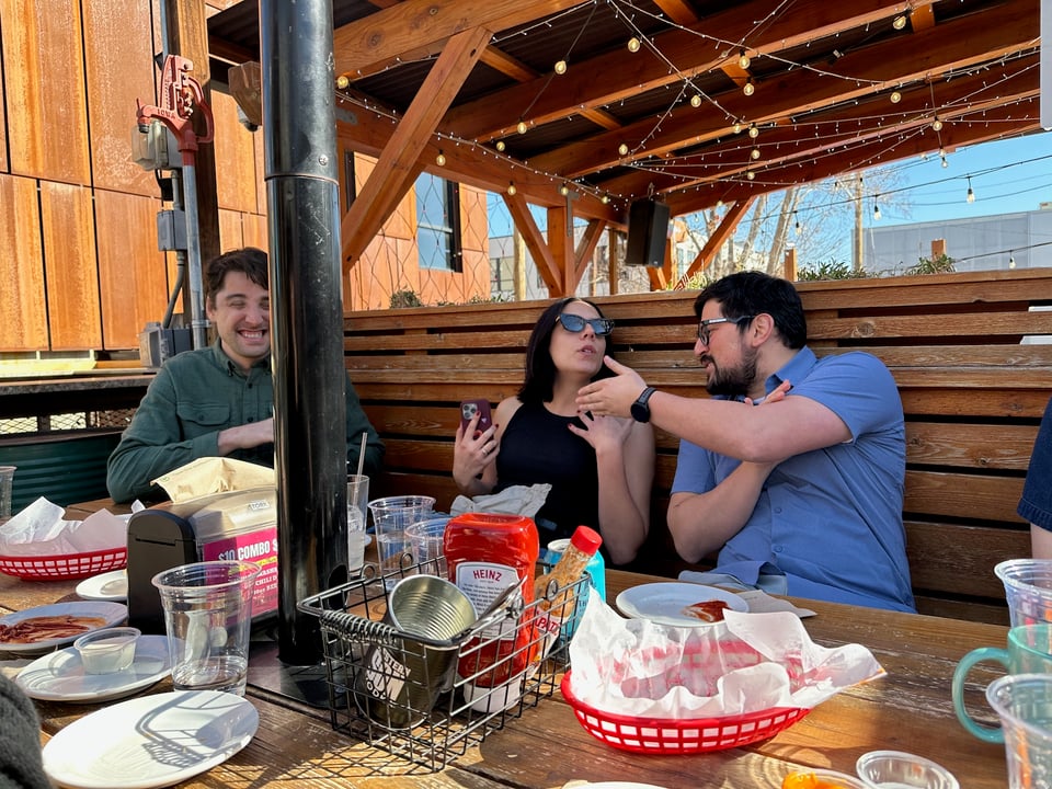 People having a lively conversation over lunch.