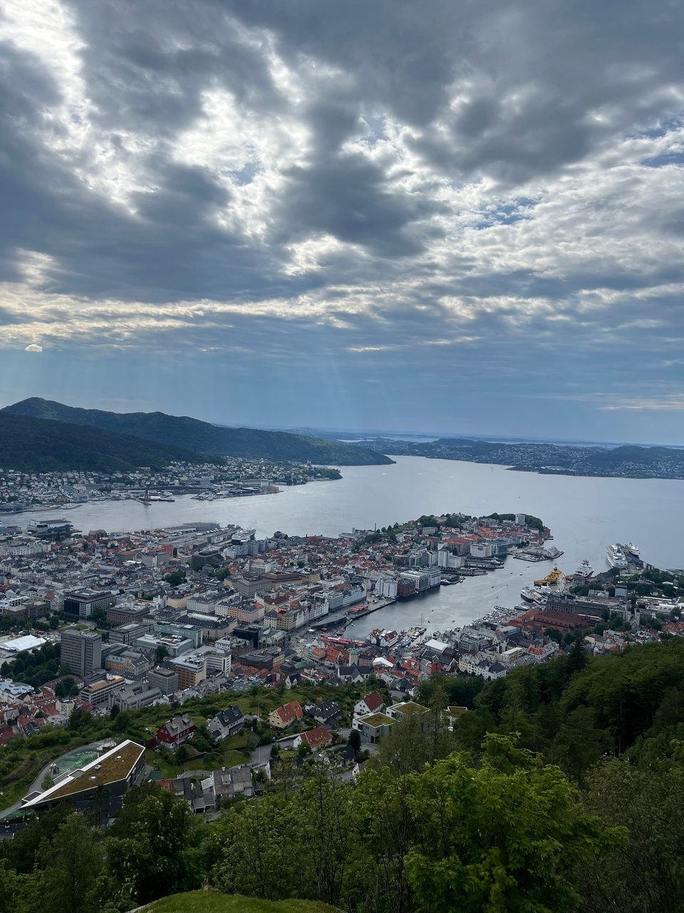 View of Bergen, Norway from above - sunlight wafting through clouds