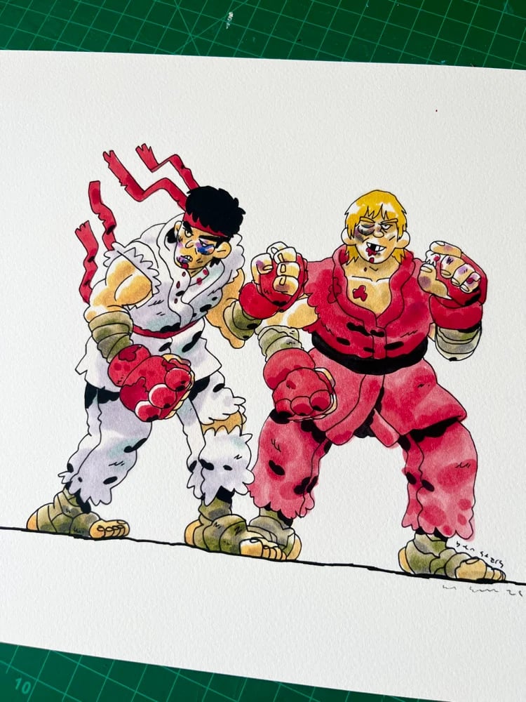 printed illustration of a couple of street fighter guys 