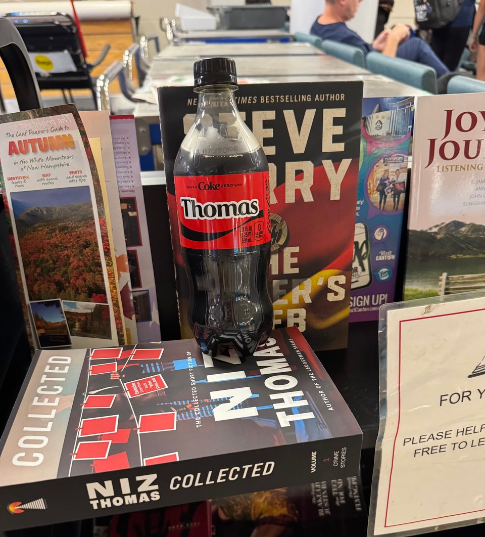 Image of Niz Thomas Collected Volume One in the airport