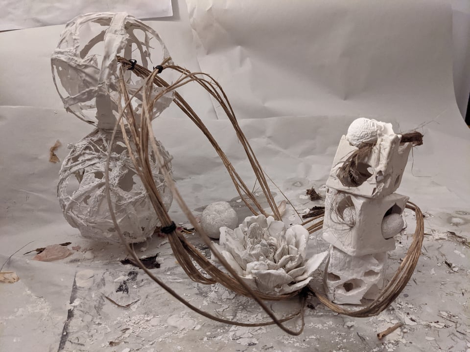 A collection of objects made out of plaster