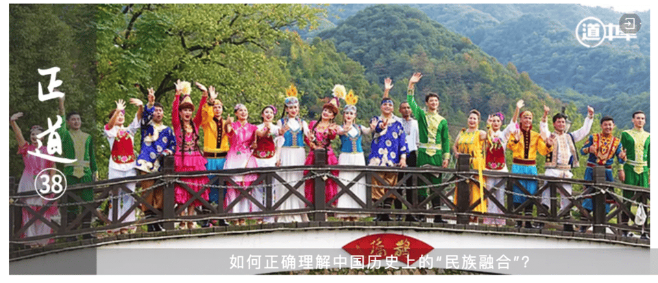 smiling and waving people dressed in clothing of China's official minority groups.