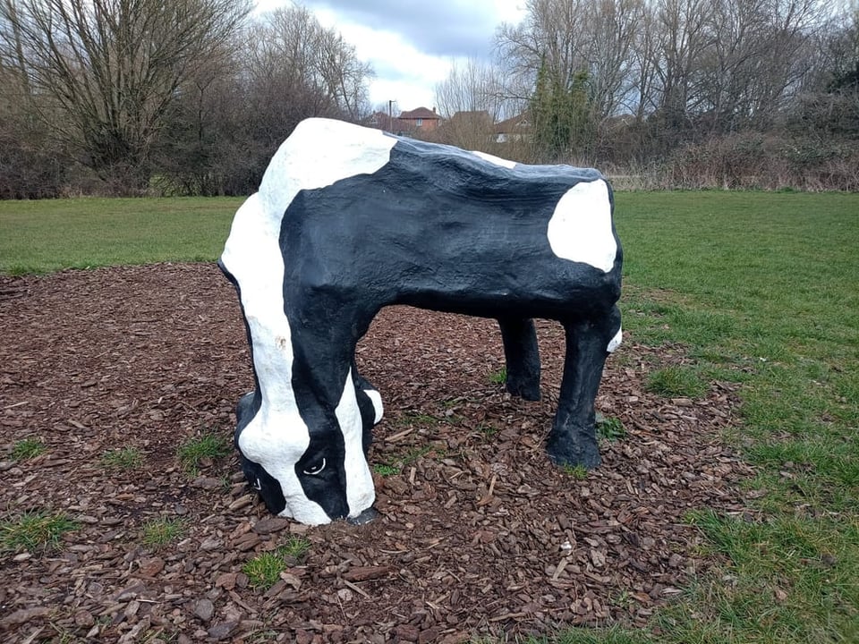 A cow. Made of concrete.