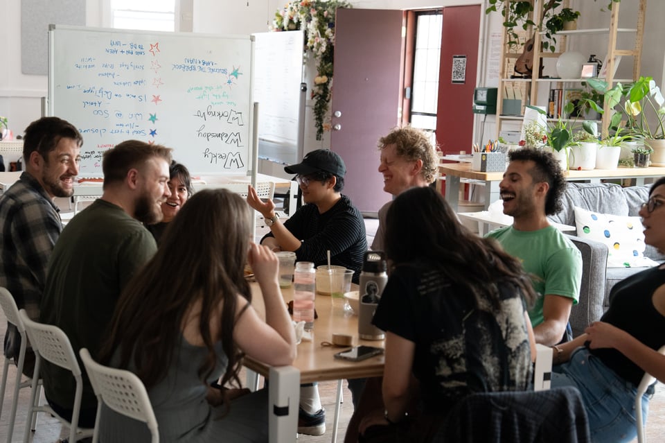 A group sitting around a table.