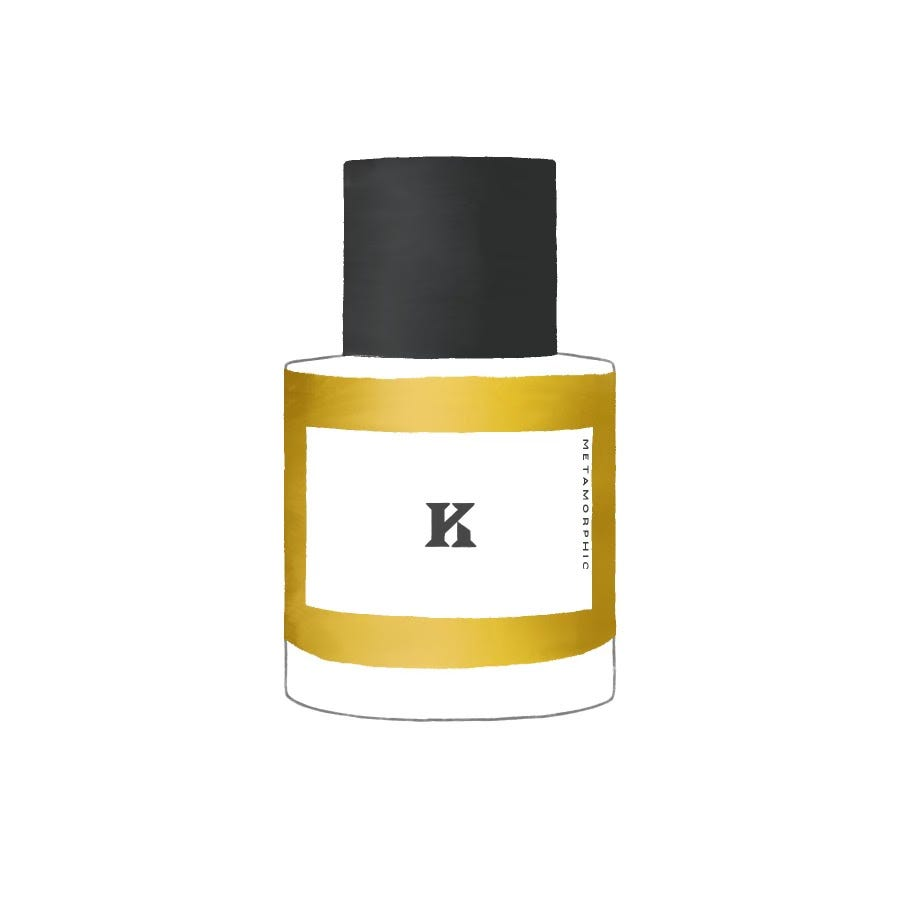 A bottle of Metamorphic perfume by Kingdom Scotland