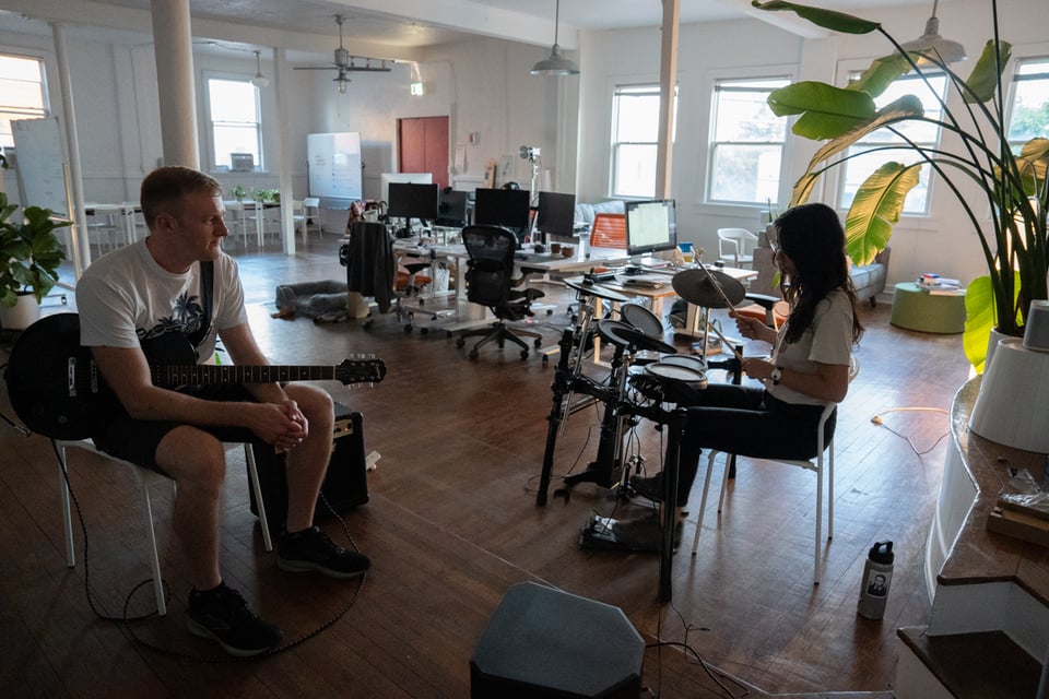 Trevr and Lexi setting up for jam night.