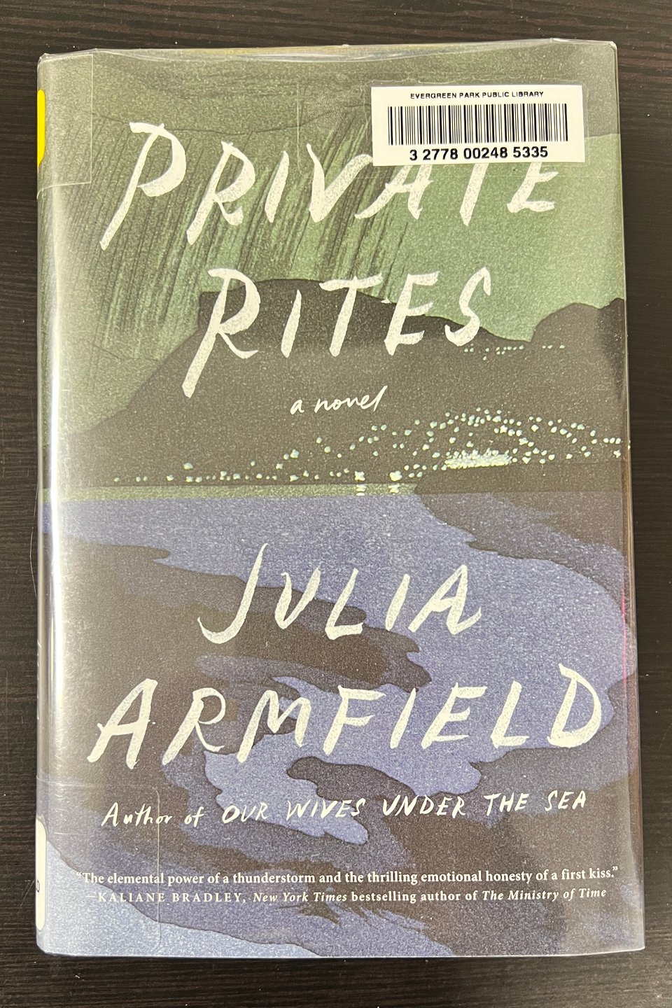 A harcover copy of the novel Private Rite by Julia Armfield