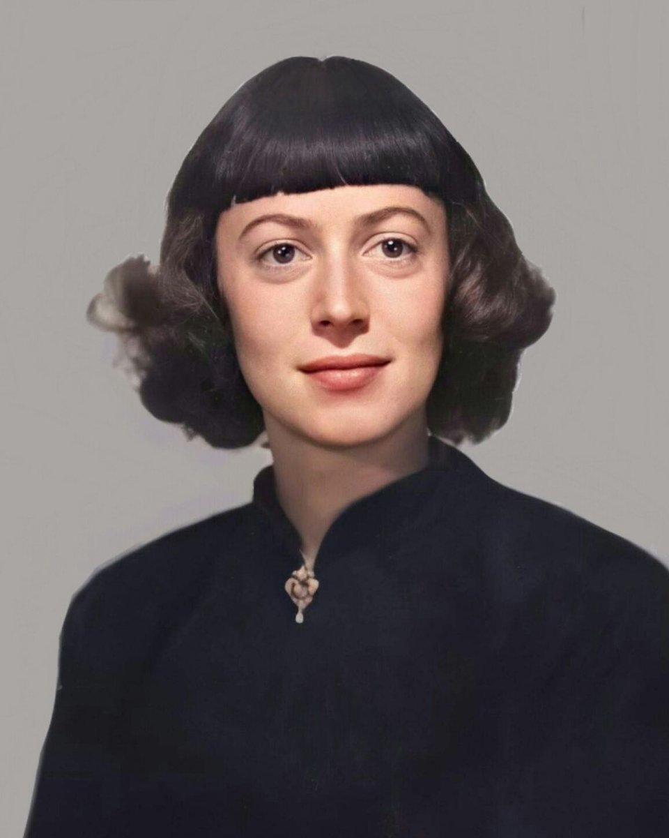 portrait of Ursula K. le Guin, with bangs and a broche