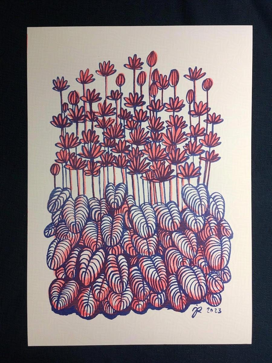 A risography print of a flower in dark blue and red