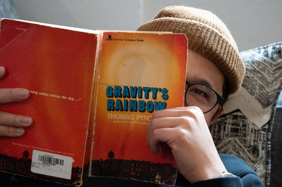 Norton reading a book.