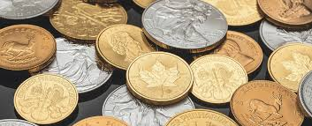 a pile of coins, all sorts of metal and colors