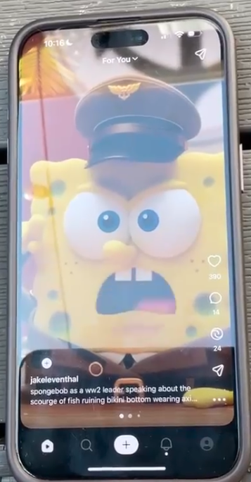 An angry-looking SpongeBob, wearing a brown military cap, takes up most of an iPhone screen. At the bottom of the screen is presumably the Sora 2 prompt: "spongebob as a ww2 leader speaking about the scourge of fish ruining bikini bottom axi..."