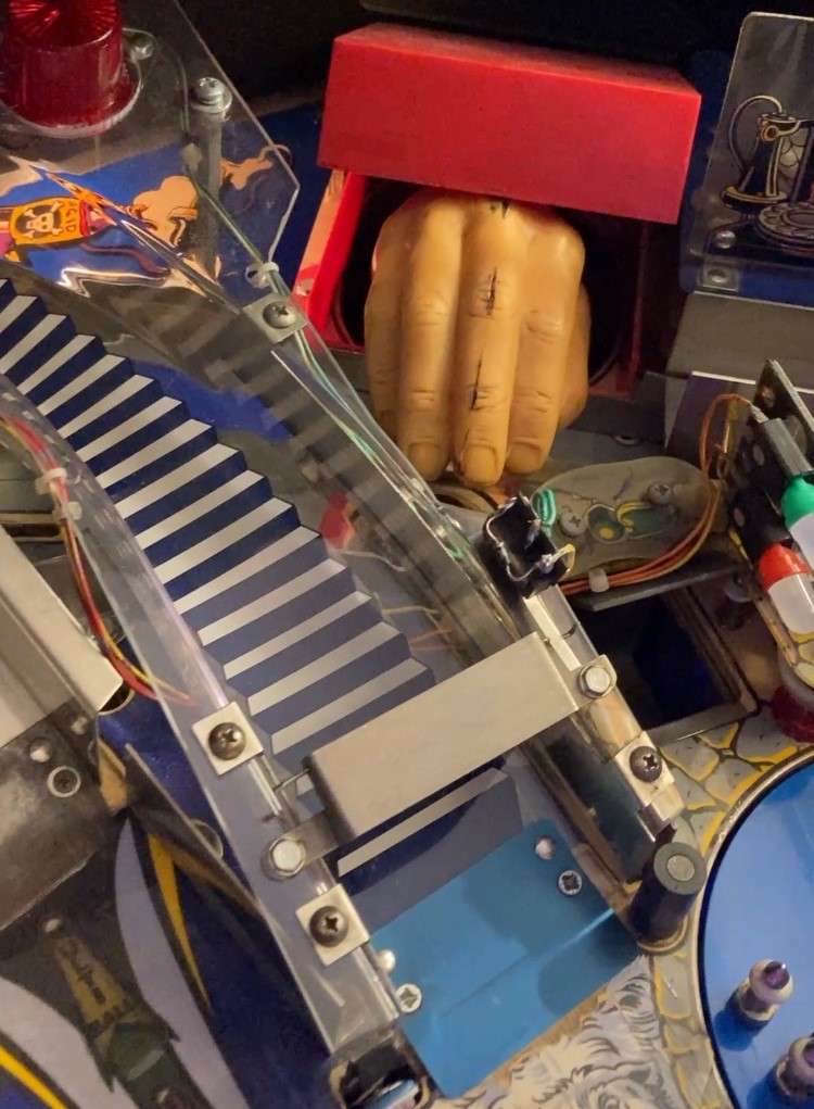 Image of The Thing feature in The Addams Family pinball machine.
