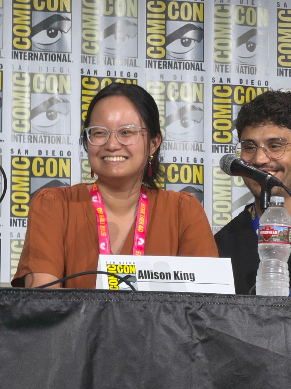 Me on a panel at SDCC, with a name tag in front