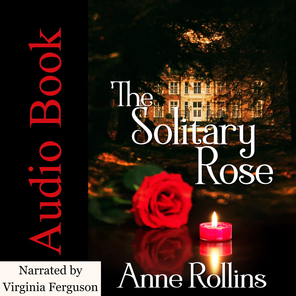 Square graphic with a black background. On the left are the vertical words “Audiobook” in large red text and the words “Narrated by Virginia Ferguson” horizontally at the bottom. On the right is a photo of an English manor house in the background, partially obscured by leafy trees. In the foreground is a red rose in full bloom and a short red candle with a bright flame. White lettering over the image reads: “THE SOLITARY ROSE” and the author’s name: “Anne Rollins,” at the bottom.