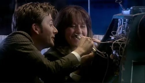 The Tenth Doctor and Sarah Jane Smith fixing K9 in DOCTOR WHO - SCHOOL REUNION