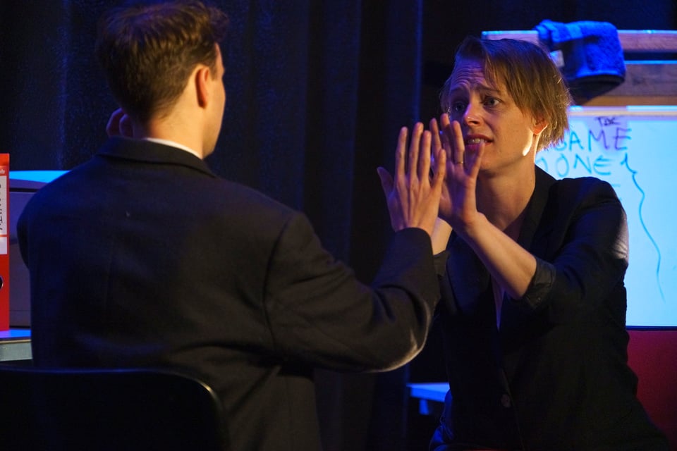 Laura Doorneweerd-Perry and Liam Webber in a parlour scene