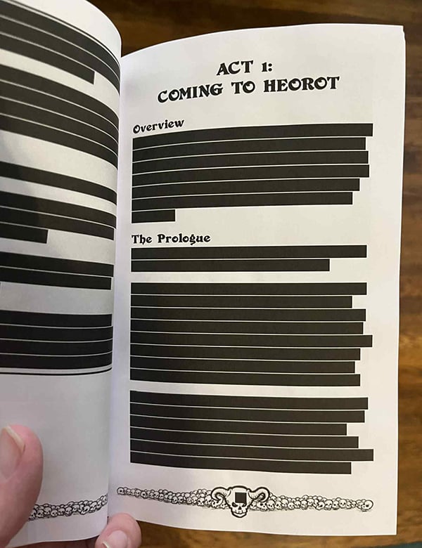 The inside of the book, which looks good except that all of the text is covered up by black bars, as though it has all been redacted by the NSA.