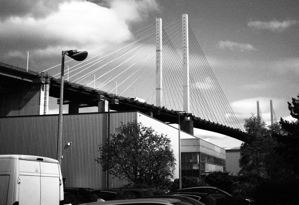 A black and white photo of the Dartford Crossing bridge