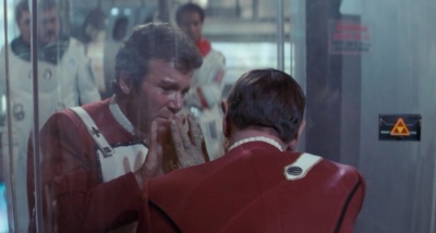 Kirk and Spock separated by the glass wall at the end of Wrath of Khan.
