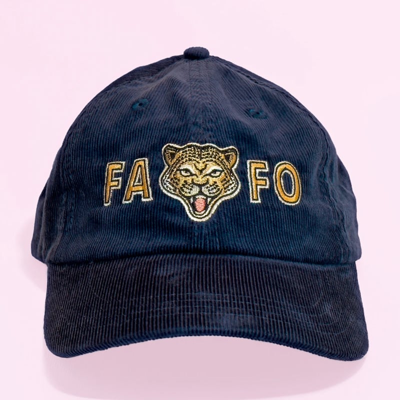Corduroy hat that says FAFO with a tiger in the middle. Embroidered.