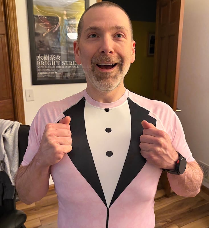 Old man who obviously does not have a suit coat on.