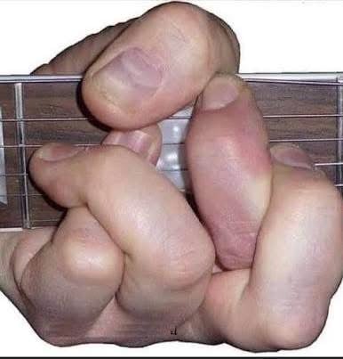 A parody pic of an impossible guitar chord