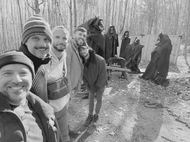 black and white group shot of team all the dead boys from halloween