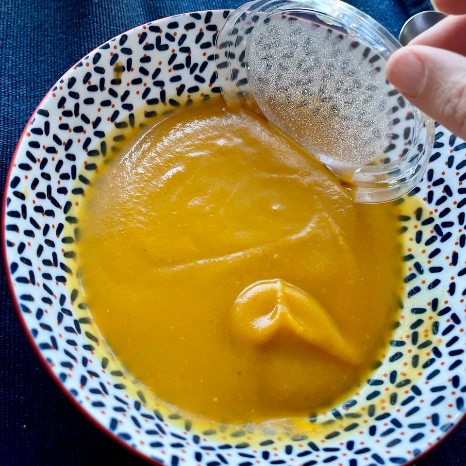 A yoghurt lid in soup
