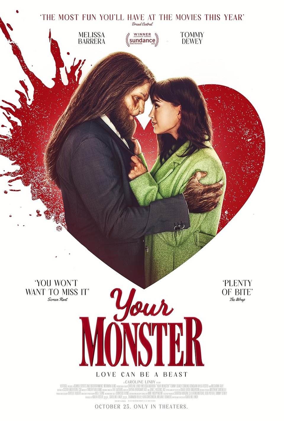 A woman with shoulder length brown hair and a green jacket, embraced by a monster with long brown hair and a beard, inside a large red heart shape, with the words "Your Monster" in red below, and the caption "LOVE CAN BE A BEAST" underneath the title