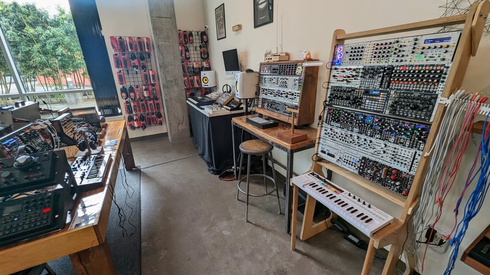 a room full of synthesizers