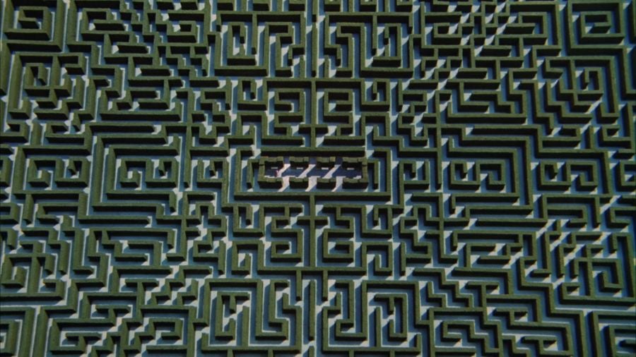 Bird’s eye view of the hedge maze at the Overlook Hotel - a complicated maze of green walls and tight angles.