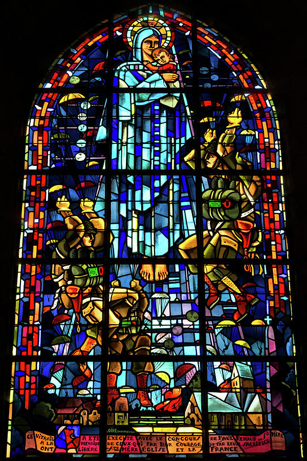 stained glass at Ste-Mere-Eglise showing paratroopers