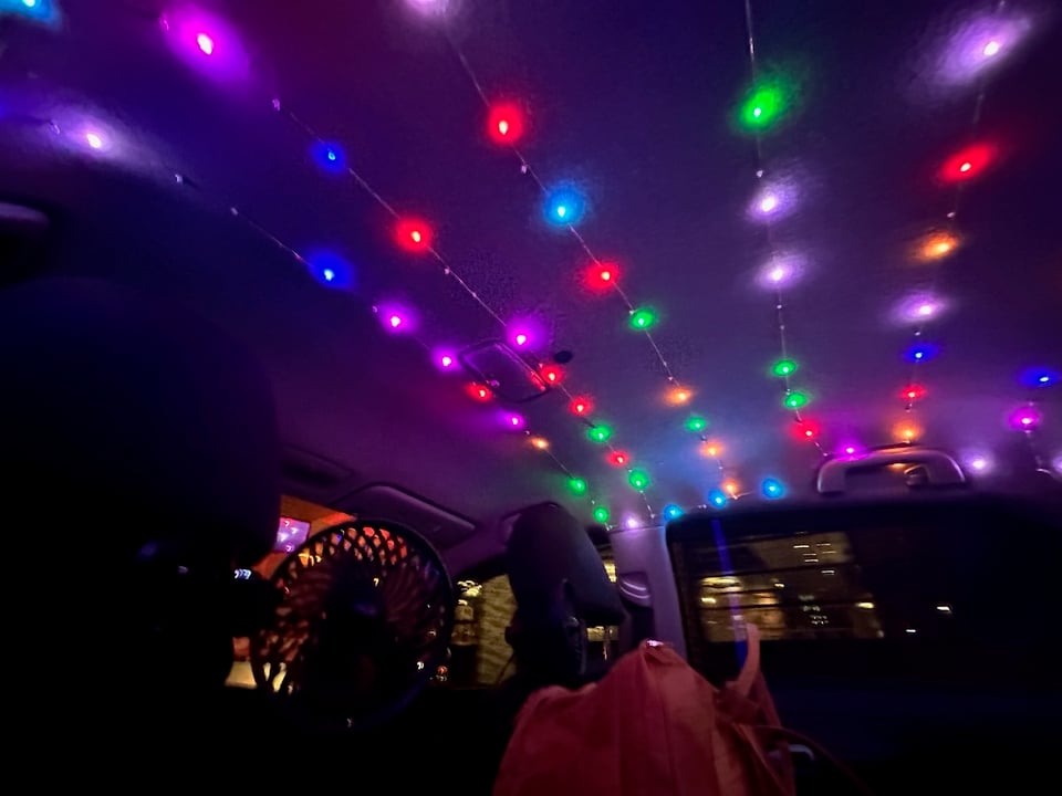 a car interior with colorful lights