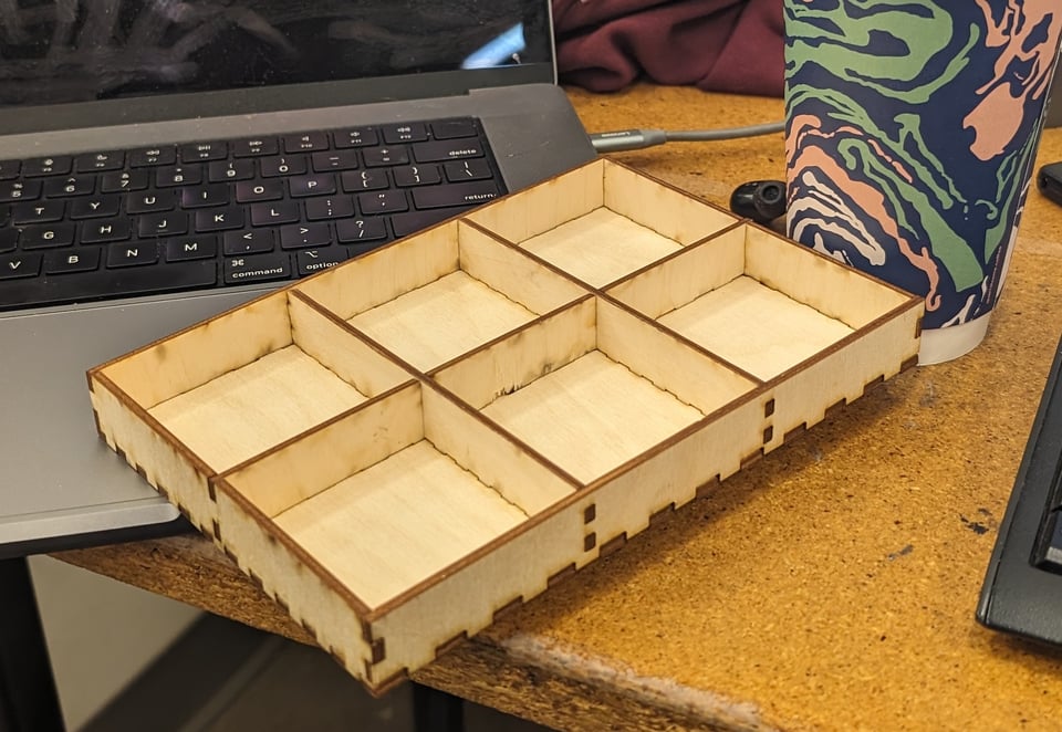 a wooden box on a desk