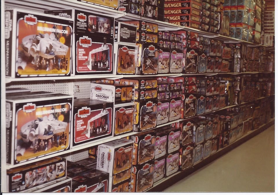 image of a toys r us aisle showing star wars toys from the 1980s