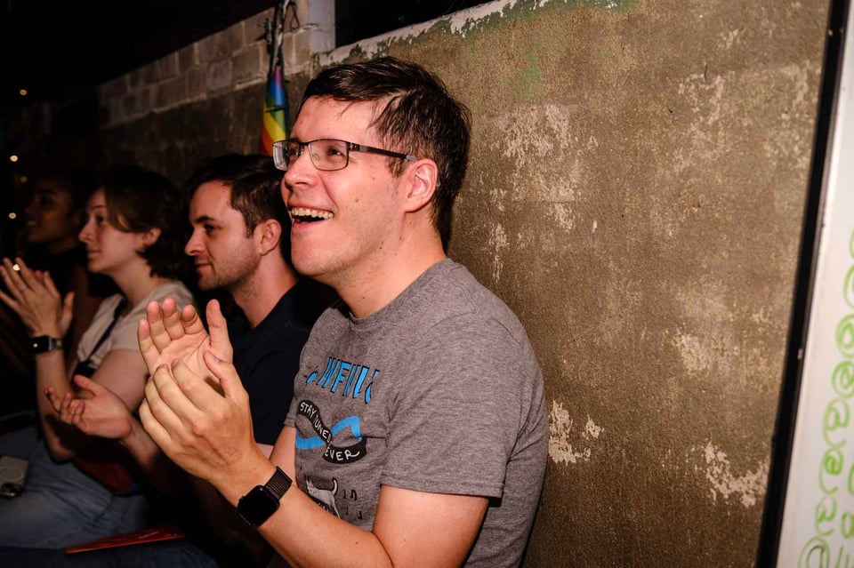 MFG clapping at the haiku slam