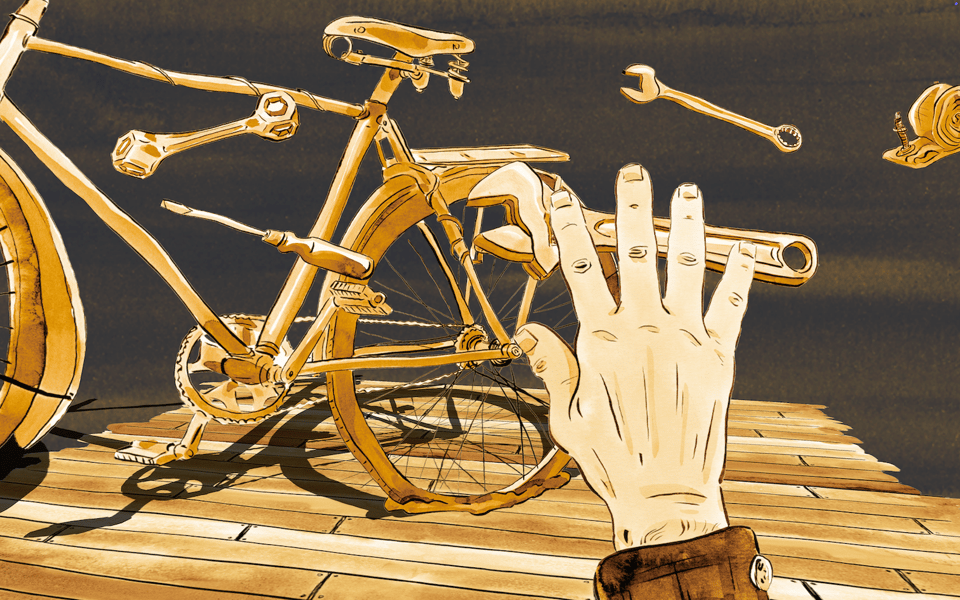 A cartoon hands holds a wrench in front of a bicycle. Various other tools - a spanner, a screwdriver, float in front of the hand.