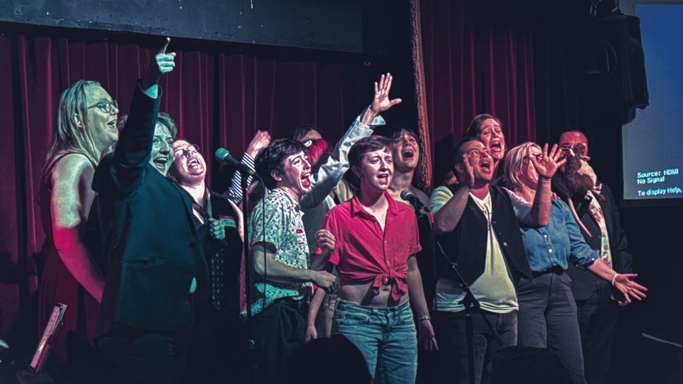 trans people singing Defying Gravity