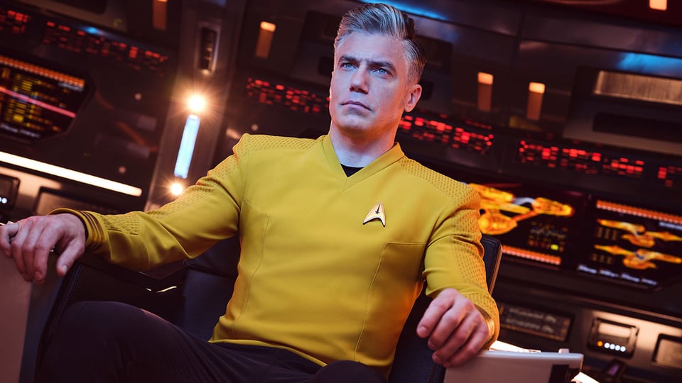 Captain Pike sitting in the captian's chair