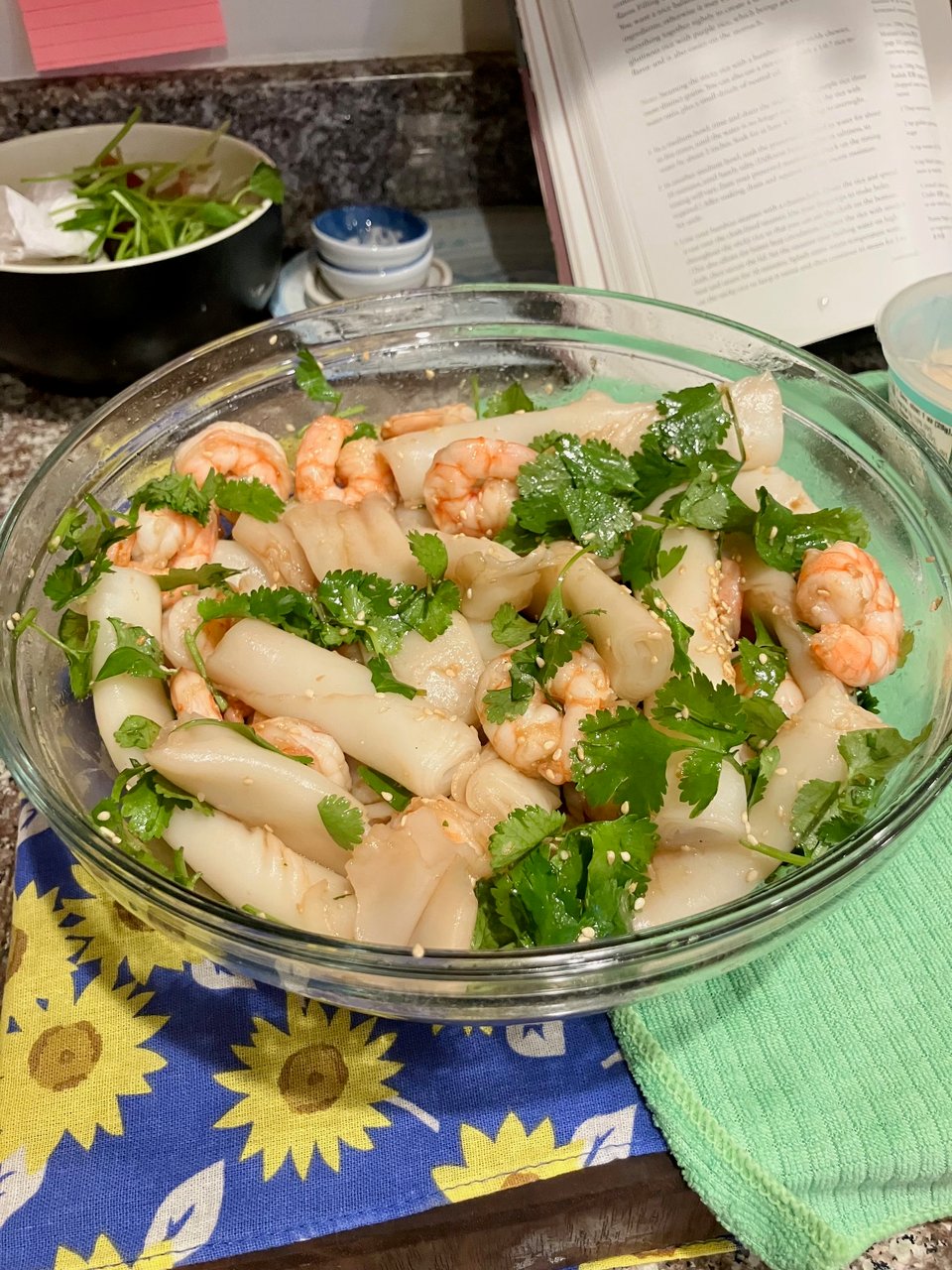 Seasoned rice rolls with shrimp, cilantro, and white sesame seeds.