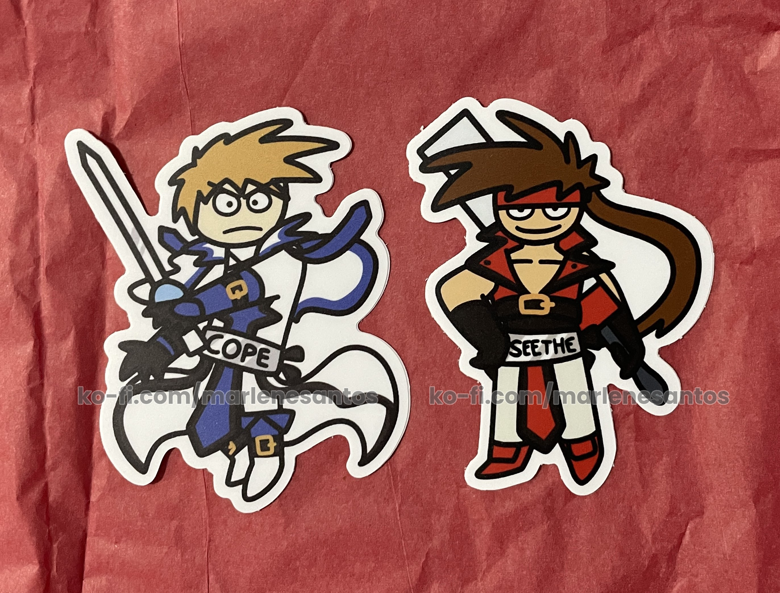 Stickers of Ky and Sol from Guilty Gear, but their belts say Cope and Seethe respectively.