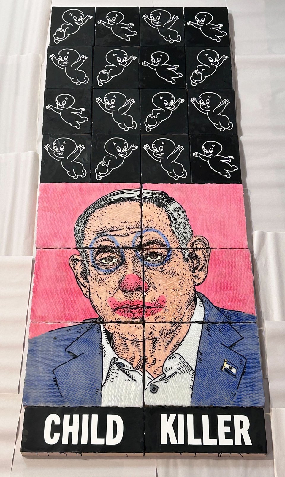 Painting of Benjamin Netanyahu in clown makeup. Above him are the images of casper the friendly ghost. Below him is the label CHILD KILLER.