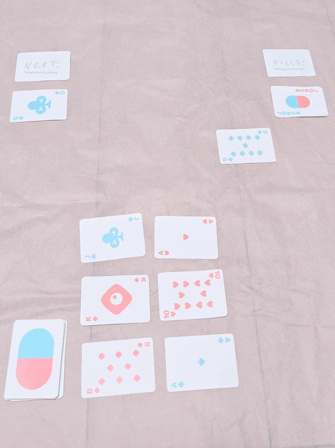 DOCTORvsVIRUS by NPCKC. Pill-themed playing cards arranged like a falling block game.