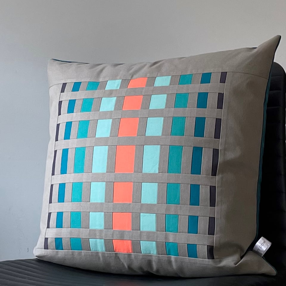 a cushion with a checkered pattern
