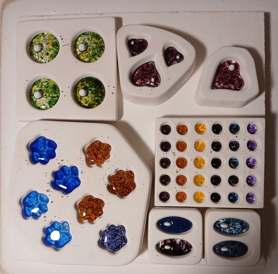 they all fully melted. there's some really nice color going on, some real vibrant blue paws and green pendants