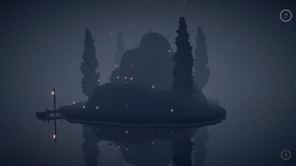 Candles cover an island with tall trees
